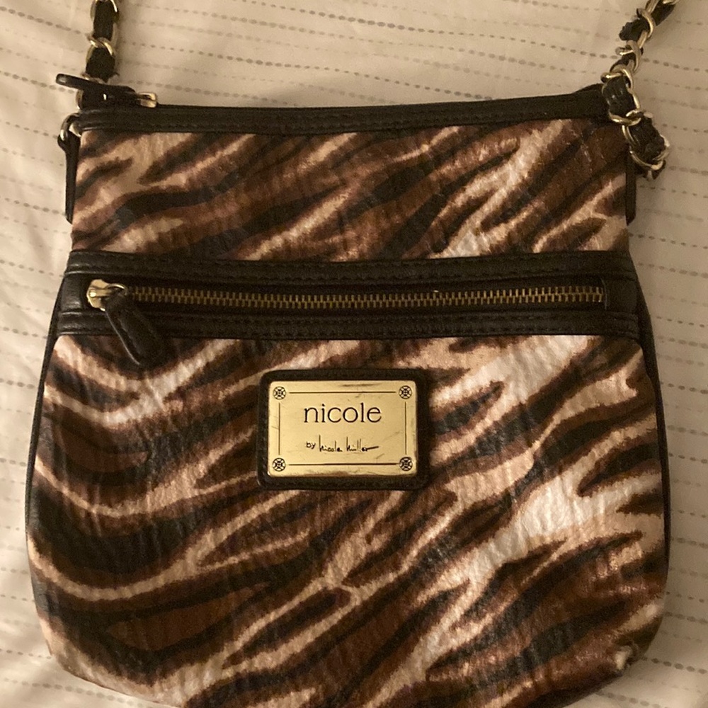 Cute leopard Nicole miller purse.